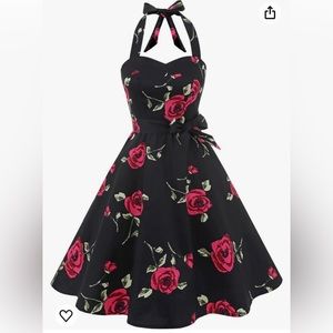 Black pinup girl dress, tie around the neck, straps, bow in the back red roses
